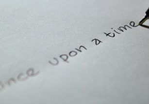 short story competitions | the words once upon a time are written on a piece of paper